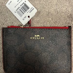 Coach wallet has care instructions inside